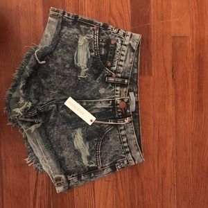 New with tags distressed acid washed cut offs